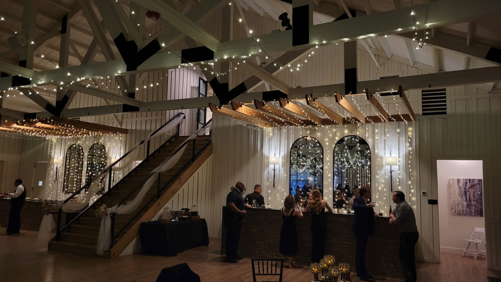 twinkle-lights-draped-over-bar-at-georgetown-wedding