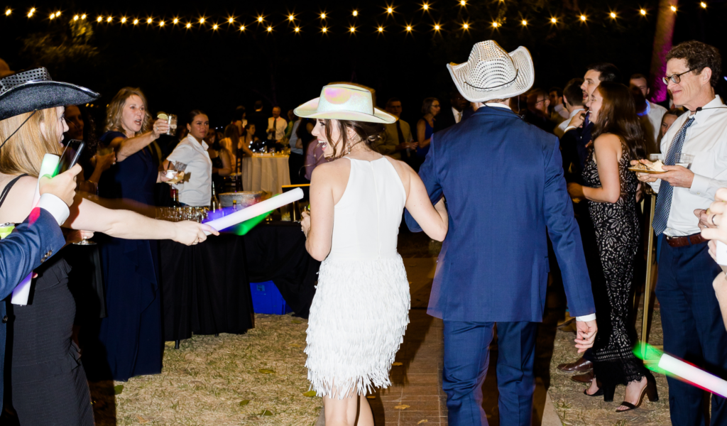 cowgirl-bridesmaid-with-cowboy-groomsmen-walking-down-aisle